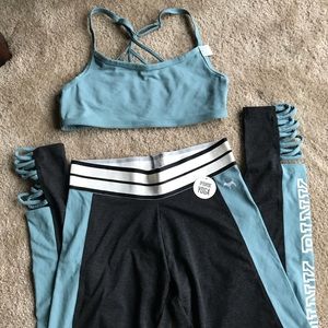 Pink leggings and sports bra